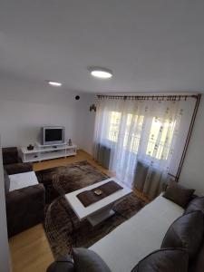 Postel nebo postele na pokoji v ubytování Vila Nina i Lux apartman