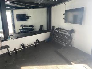 The fitness centre and/or fitness facilities at Luxury studio, sea view, pool