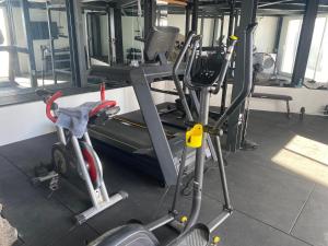The fitness centre and/or fitness facilities at Luxury studio, sea view, pool