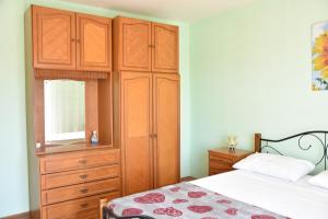 Posteľ alebo postele v izbe v ubytovaní Apartman Miki
