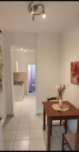 A kitchen or kitchenette at KANALI HOLIDAYS APARTMENT 1