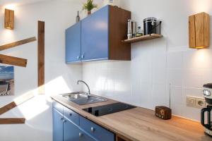 Η κουζίνα ή μικρή κουζίνα στο Aschaubichl - Wohnung Narzisse