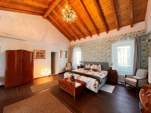 Postel nebo postele na pokoji v ubytování B&B Romantico Palazzo dei Ulivi