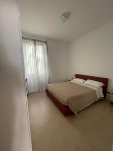 Postel nebo postele na pokoji v ubytování Antica Campione Rooms & Hostel