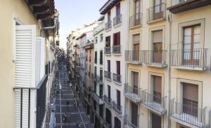 a view of a city street from an apartment building at TuApartamento El Mirador de la Estafeta in Pamplona