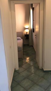 Кровать или кровати в номере Pelosa - Capo Falcone Excellent Apartment