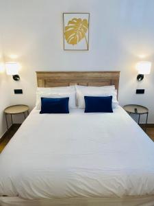 Ένα ή περισσότερα κρεβάτια σε δωμάτιο στο El Parador del César