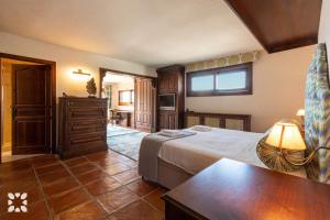 Posteľ alebo postele v izbe v ubytovaní Villa Alessia by Abahana Villas + 14 fotografií