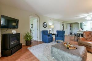 a living room with a couch and a fire place at Beautiful Condos at Thousand Hills-Heart of Branson-Spacious and Affordable in Branson