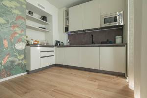 Kuchyň nebo kuchyňský kout v ubytování Villa Lucrezia - Appartamenti vista Langhe -