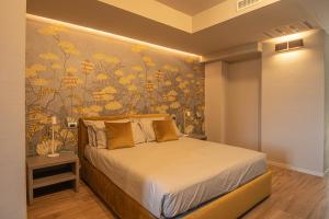 Postel nebo postele na pokoji v ubytování Villa Lucrezia - Appartamenti vista Langhe -