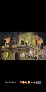 a picture of a large building with at Dwarka Home Stay 2 Only family in Dwarka