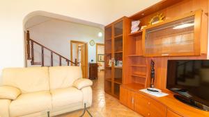 TV a/nebo společenská místnost v ubytování Sardinianworld - Villa Caterina