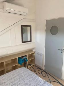 Letto o letti in una camera di Ile de Porquerolles : T3 climatisé vue mer