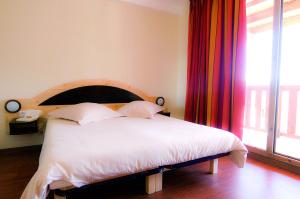 Ένα ή περισσότερα κρεβάτια σε δωμάτιο στο VTF Les Carlines