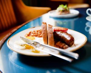 a plate of food on a blue table at Richmond Hill Hotel in Richmond upon Thames