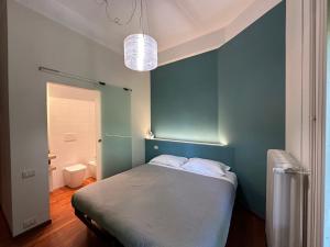 Кровать или кровати в номере Room & Breakfast D'Annunzio