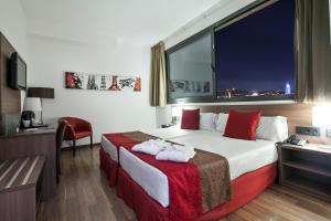 Postel nebo postele na pokoji v ubytování Hotel Best 4 Barcelona