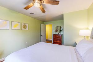 Postel nebo postele na pokoji v ubytování Flip Flop Inn