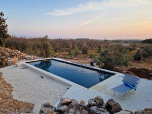 The swimming pool at or close to Masseria Bianca