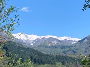 a view of a mountain range with snow covered mountains at Birillina Guest House di Laura Reni in Poggio