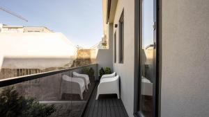 Balkon atau teras di Casa Mouzi by LovelyStay