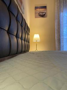 Postel nebo postele na pokoji v ubytování Mariposa suites