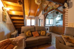 Posezení v ubytování Casa rural Los Cántaros. Zarapicos + 25 fotografií