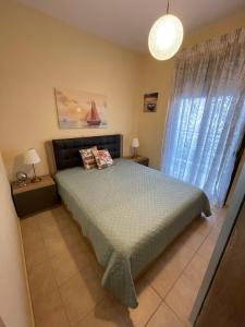 Postel nebo postele na pokoji v ubytování Mariposa suites