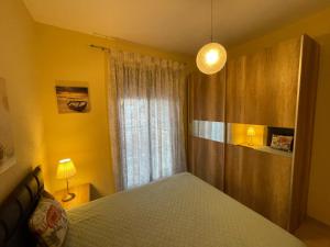 Postel nebo postele na pokoji v ubytování Mariposa suites