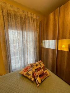 Postel nebo postele na pokoji v ubytování Mariposa suites