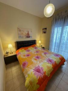Postel nebo postele na pokoji v ubytování Mariposa suites