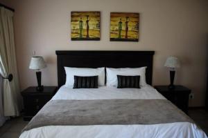 Una cama o camas en una habitación de Hotel Tum's Water World