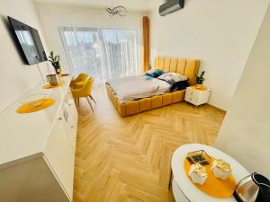 Ένα ή περισσότερα κρεβάτια σε δωμάτιο στο Horizon Park 23 Boszkowo