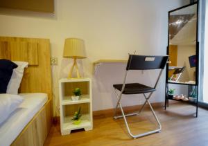 Televiisor ja/või meelelahutuskeskus majutusasutuses R101- Cosy and stylish apartment with King Size Bed- Belvédère