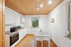 Köök või kööginurk majutusasutuses home2stay Apartmenthaus Waiblingen City Kitchen,Wifi,Parking ***