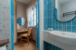 Koupelna v ubytování Sea of Love Suite Cafe Pattaya