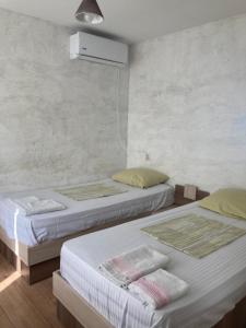 A bed or beds in a room at Kokhta guest house On the mountain
