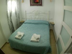 Una cama o camas en una habitación de Apartamento Miguel y Rosa 2