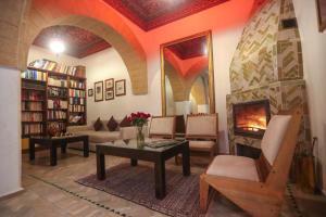 Posezení v ubytování Riad Perle D'Eau