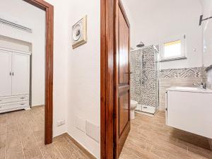 Et badeværelse på Albeleo Apartments + 15 billeder