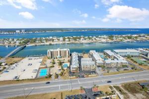an aerial view of a harbor with buildings and the water at Lei Lani Village 112 by Vacation Homes Collection in Orange Beach