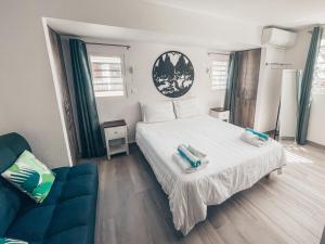 Postel nebo postele na pokoji v ubytování Joliebeachsxm