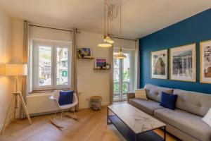 Ruang duduk di Appartement avec vue sur vignoble
