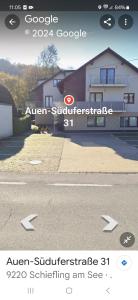 a screenshot of a website of a house at BlueLine Apartments am Wörthersee in Schiefling am See