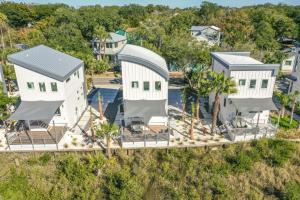 an aerial view of a white house with trees at 194 Riberia - Downtown Waterfront Luxury Home in St. Augustine