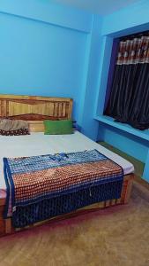 En eller flere senger på et rom på 3BHK Flat Near Kashi Vishwanath temple