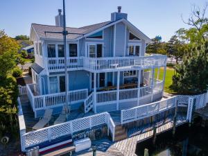 an aerial view of a house with a large deck at Luxury Waterfront Villa Dock Game Room Sunset Views in Ocean City