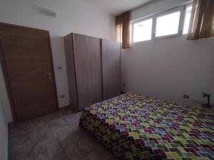 Postel nebo postele na pokoji v ubytování Il Negramaro
