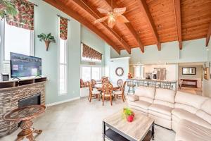 a living room with a couch and a fireplace at Luxury Penthouse Apartment with Private Elevator in Ocean City